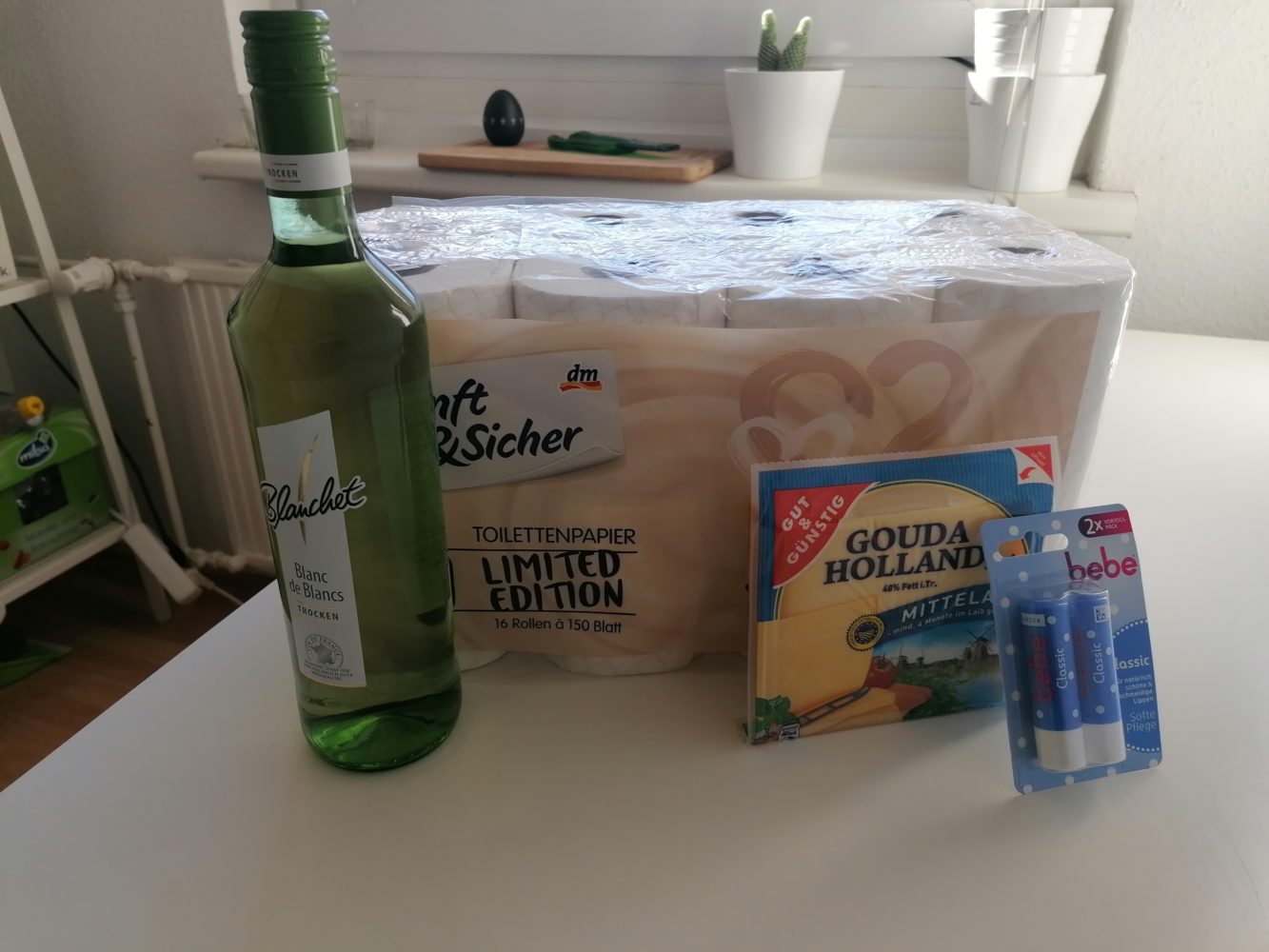 Quarantine Essentials - Wine, Toilet Paper, Cheese and Lipbalm